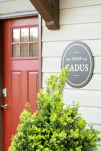 A front door with a red paint.
