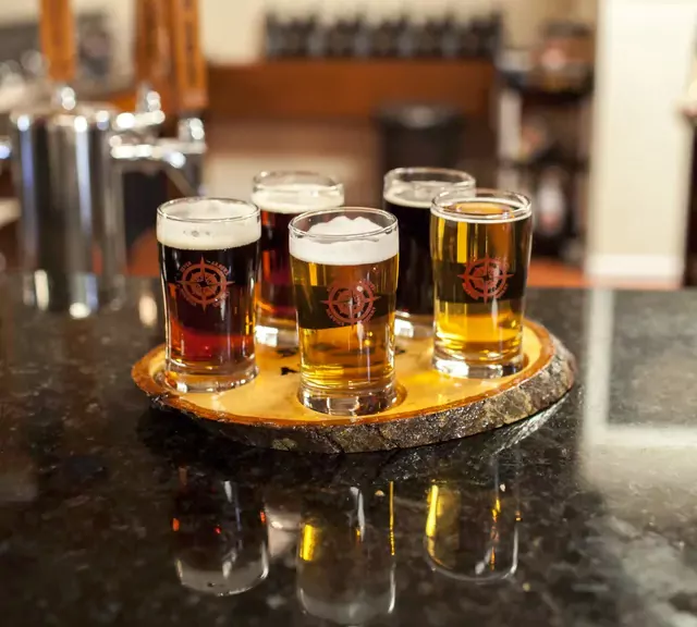 Five glasses of beer.