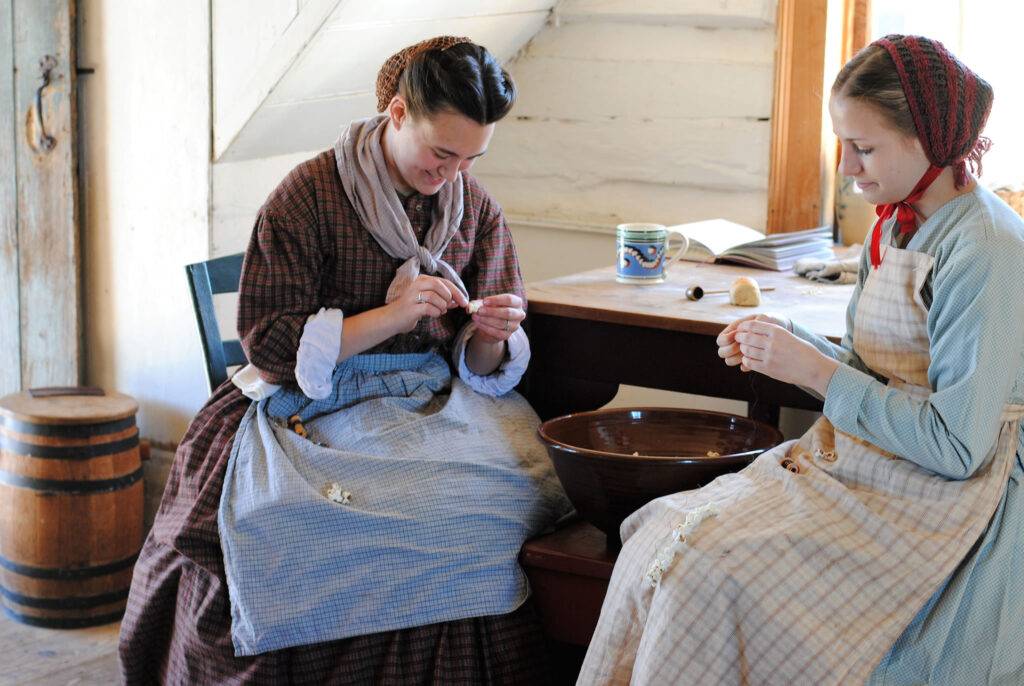 Two woman tailoring.