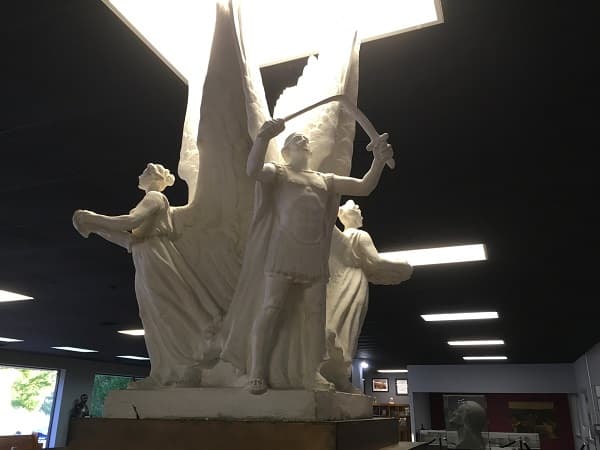 Three statues inside the museum.