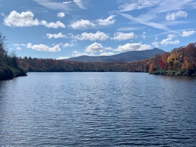 Lake with a mountain view in the background.