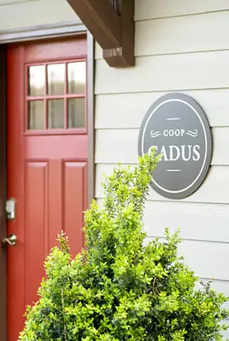 A front door with a red paint.